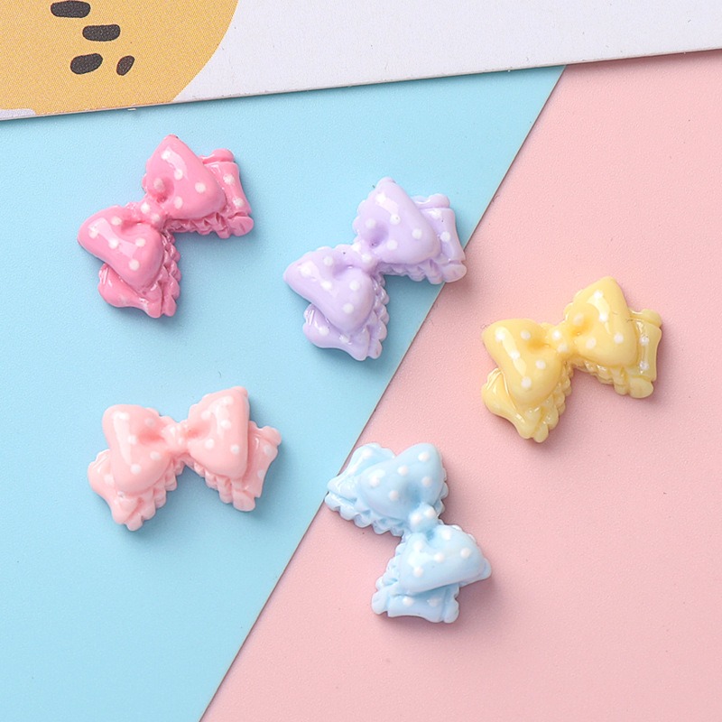 Art Craft Items - ชาร์มเรซิ่นรูปโบว์ขนาดเล็ก 7 สี ลายจุด ประกายเงา แบบติดหลังเรียบ